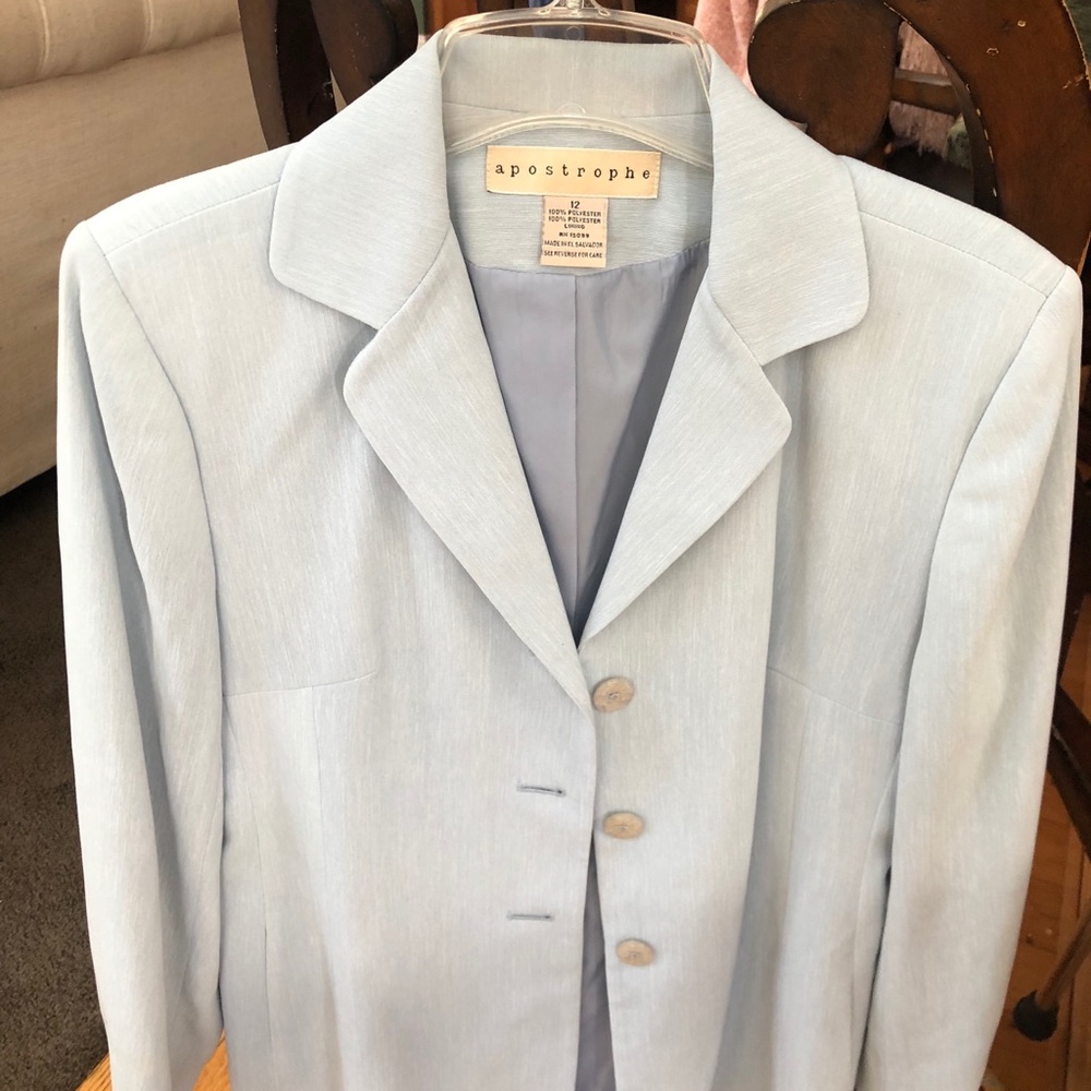 New light blue “Apostrophe” suit jacket and skirt